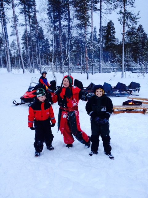 Playing in the snow with elves on our family adventure to Lapland