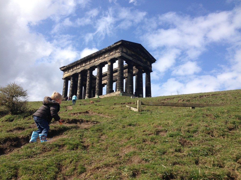 A family exploring Penshaw Monument, a National Trust estate in the North East