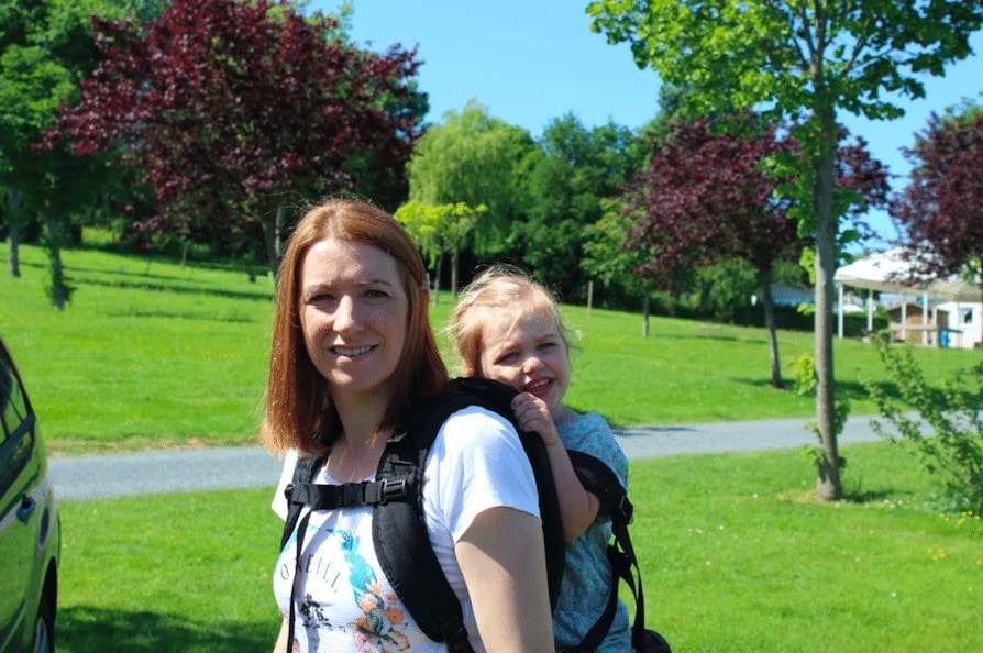 Carrying a child in the Freeloader Child Carrier, part of my travel tips series on Mini Travellers