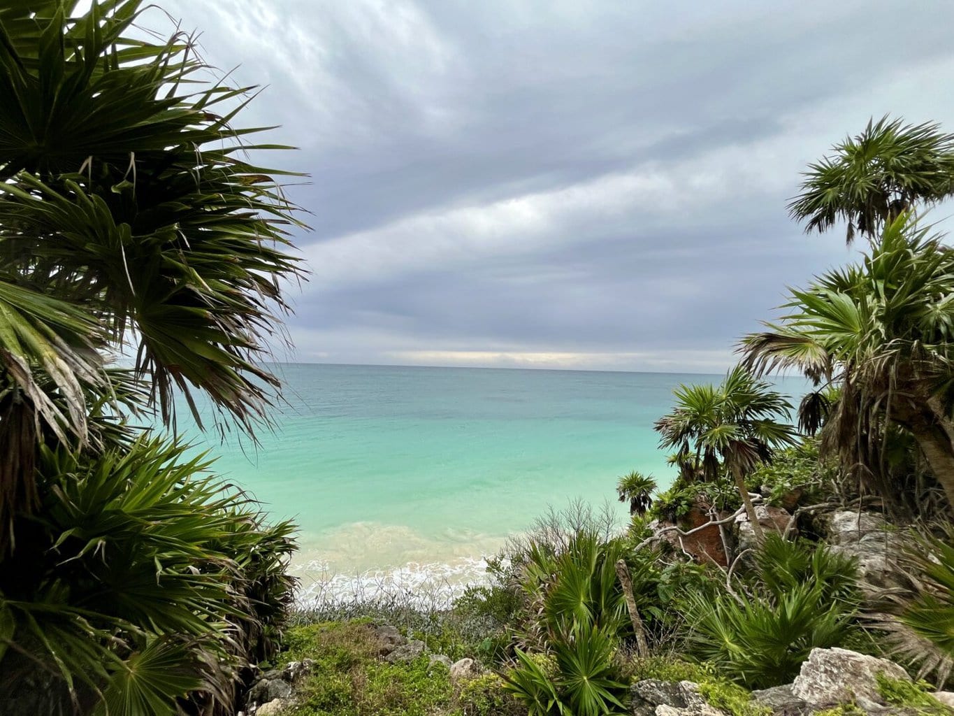 Tulum was a major Mayan city and served as a significant port during the late Postclassic period (AD 1200 to 1521). The ruins are situated on the cliffs along the Caribbean Sea and are known for their stunning coastal views.